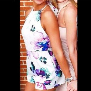 Luxell floral romper with halter and open back